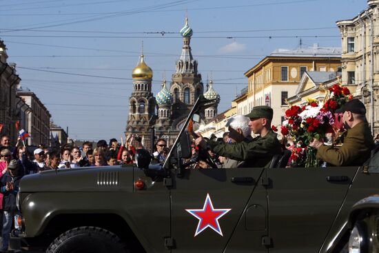 War veterans march along Nevsky Avenue