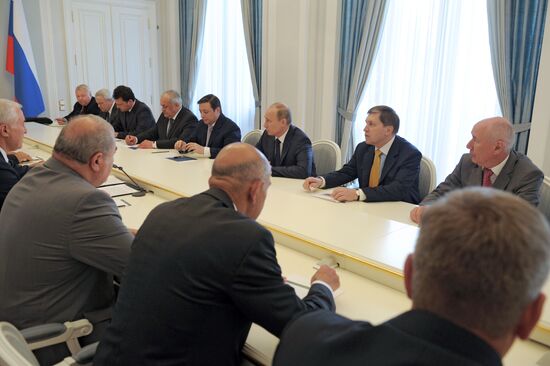 Putin, Tibilov hold talks