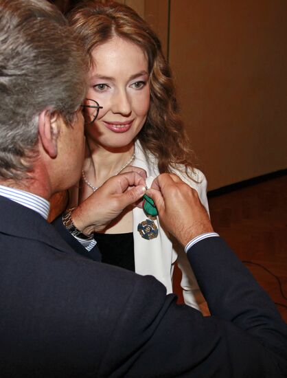Reception after Yekaterina Polozova decorated with order