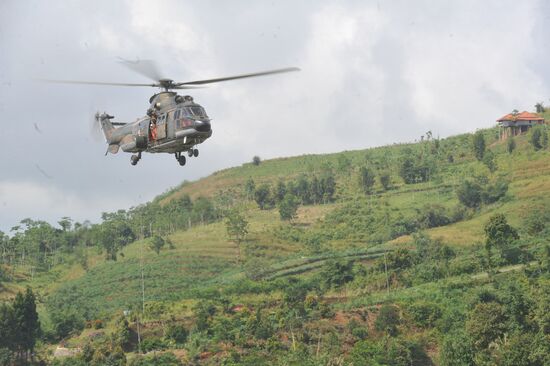 Search operation at Sukhoi SuperJet-100 crash site