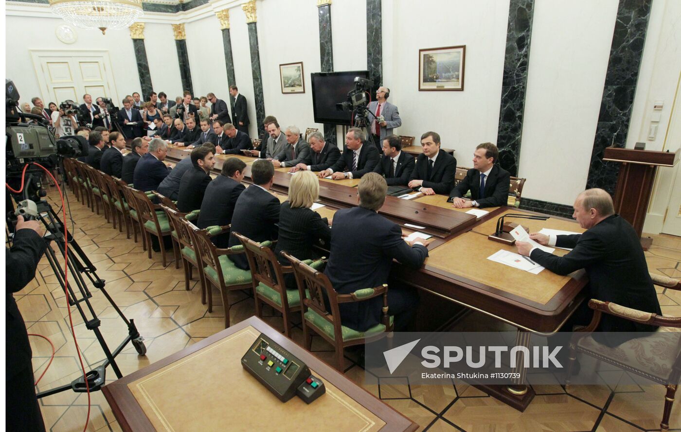Vladimir Putin meets with members of the government