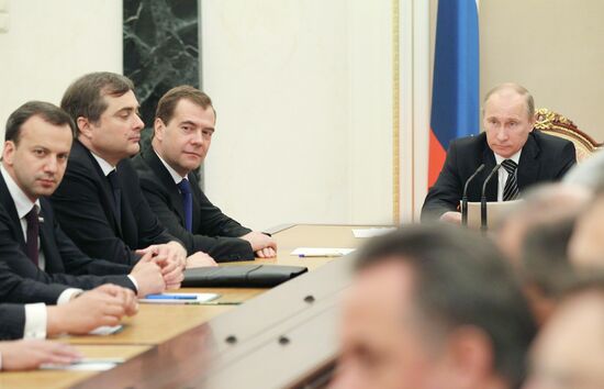 Vladimir Putin meets with members of the government