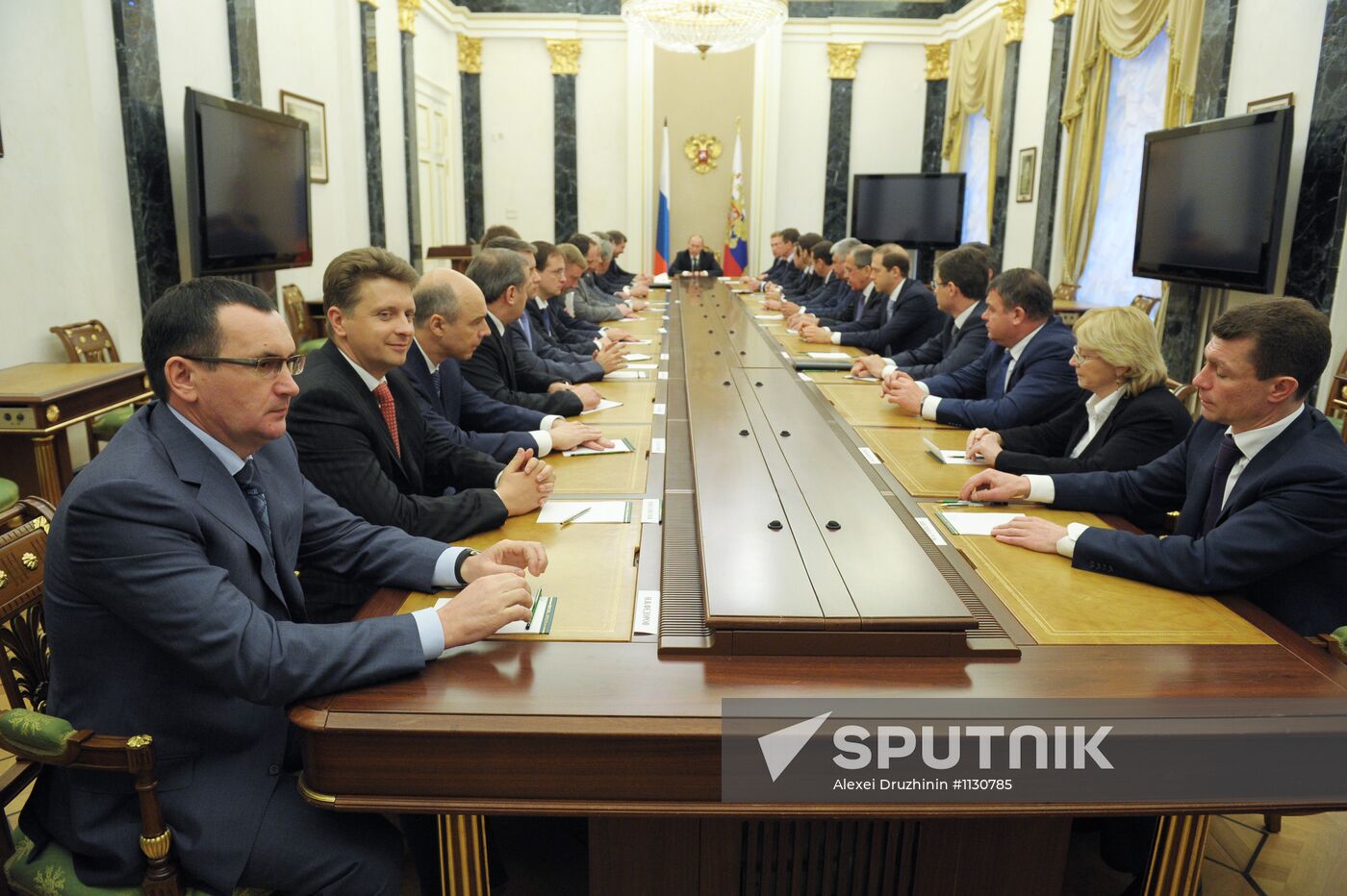 Vladimir Putin meets with members of the government