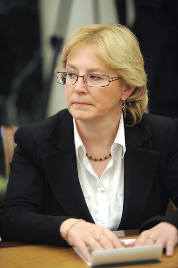 Vladimir Putin meets with members of the government
