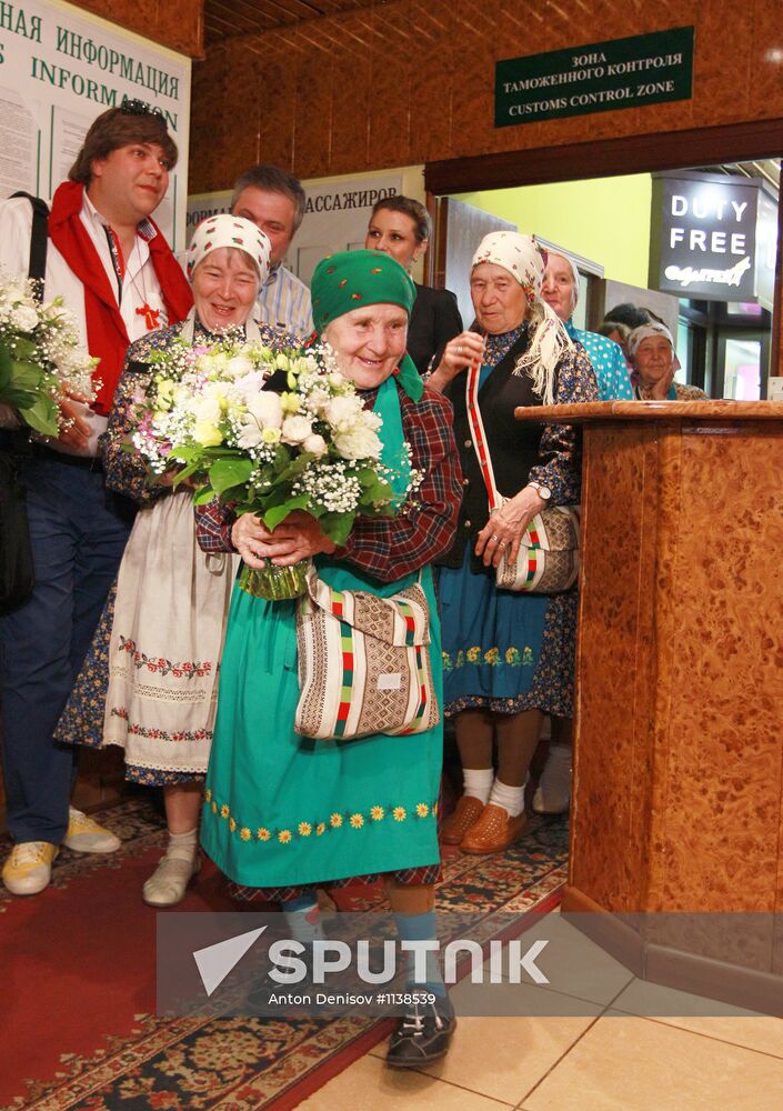Members of Buranovskiye Babushki band arrive in Moscow