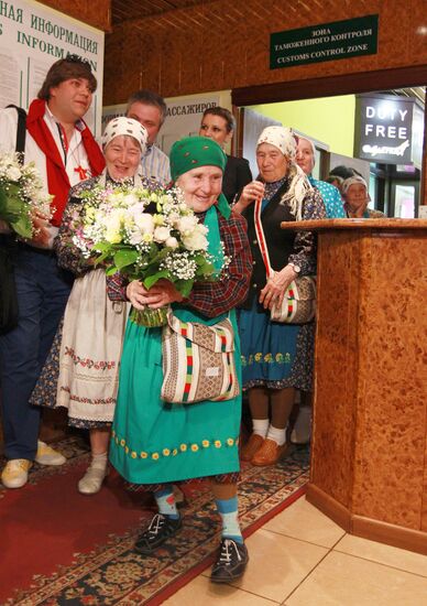 Members of Buranovskiye Babushki band arrive in Moscow