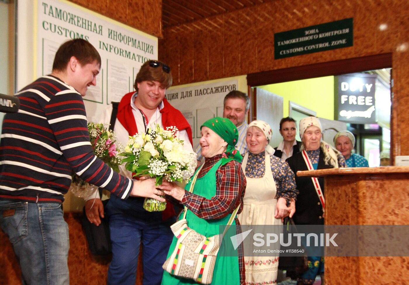 Members of Buranovskiye Babushki band arrive in Moscow