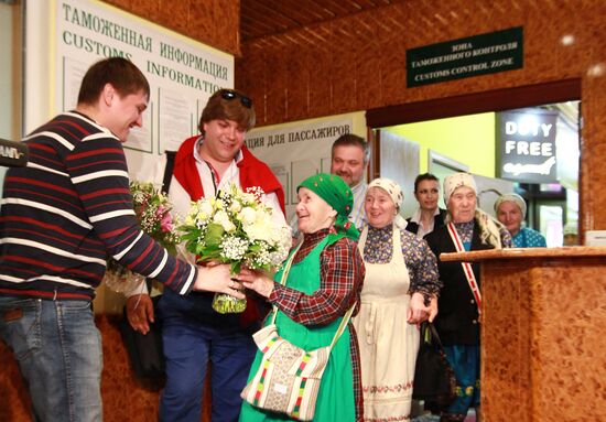 Members of Buranovskiye Babushki band arrive in Moscow