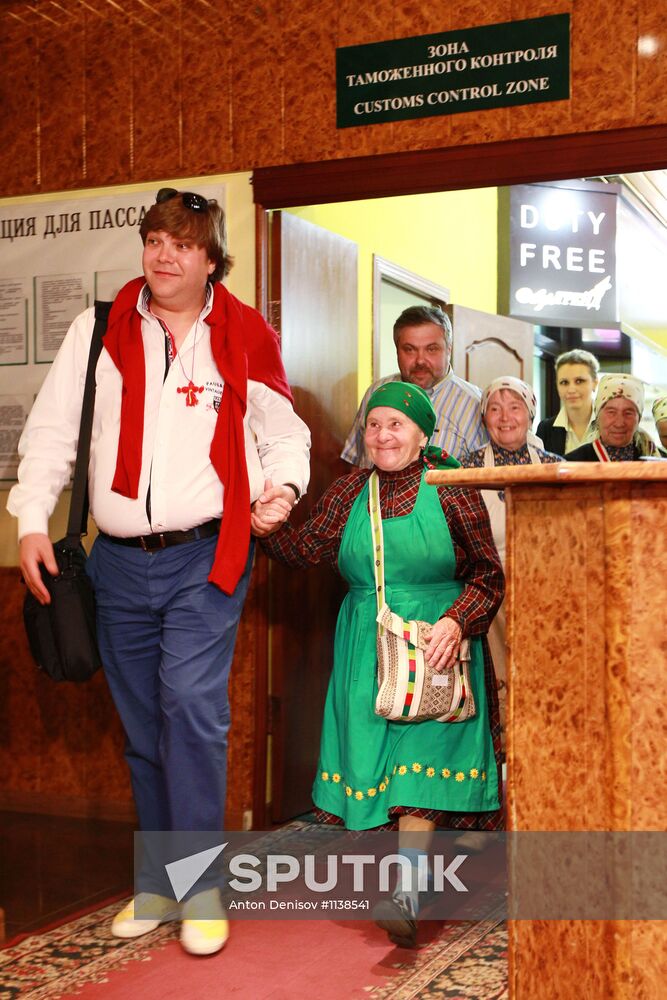 Members of Buranovskiye Babushki band arrive in Moscow