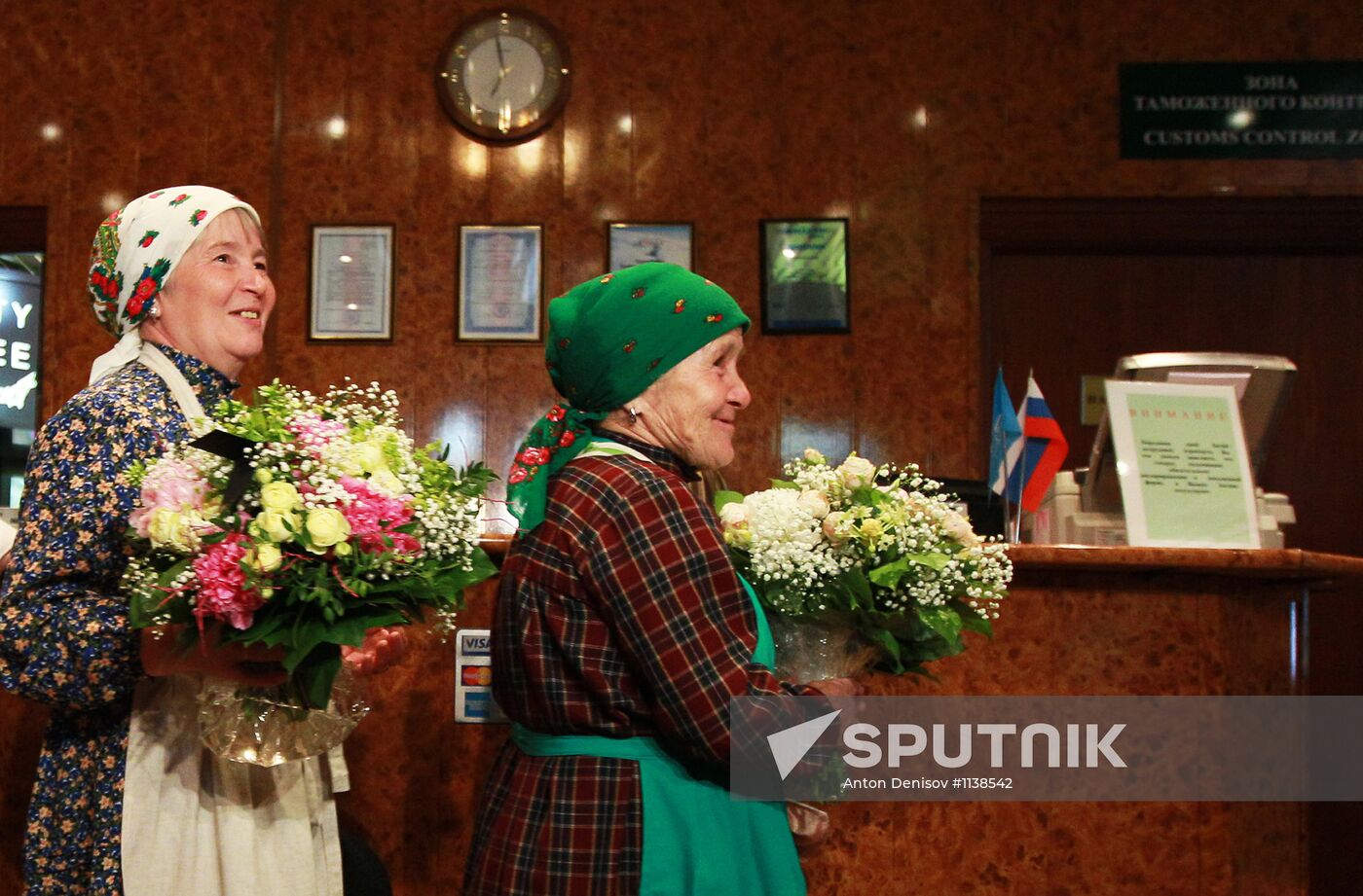 Members of Buranovskiye Babushki band arrive in Moscow