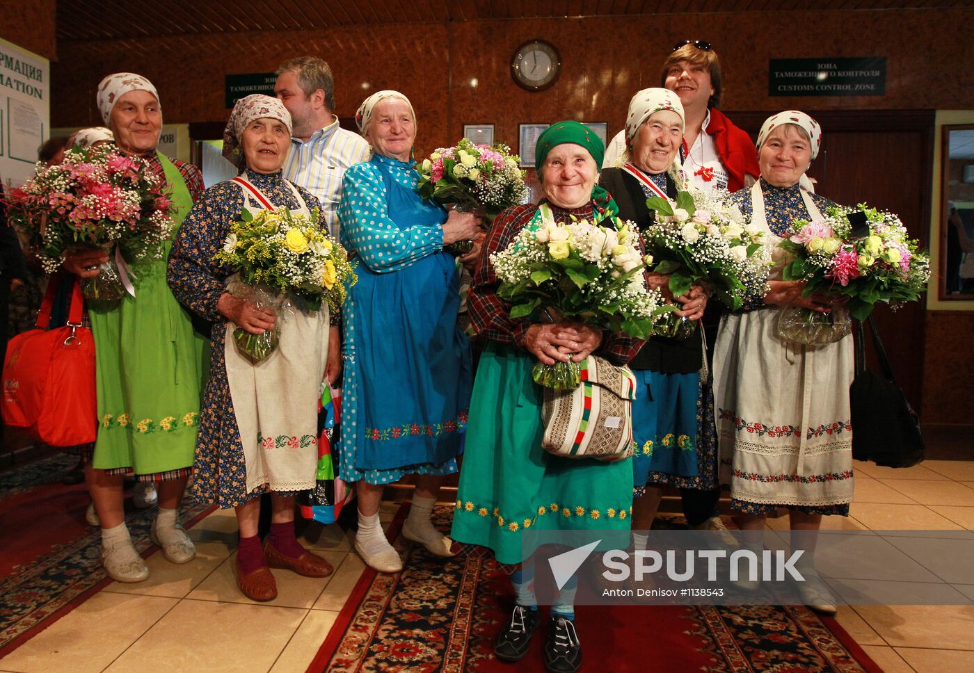 Members of Buranovskiye Babushki band arrive in Moscow