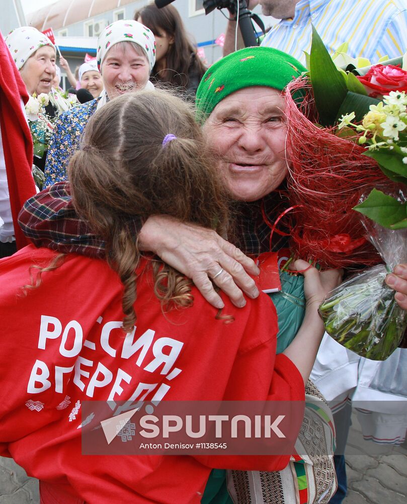 Members of Buranovskiye Babushki band arrive in Moscow