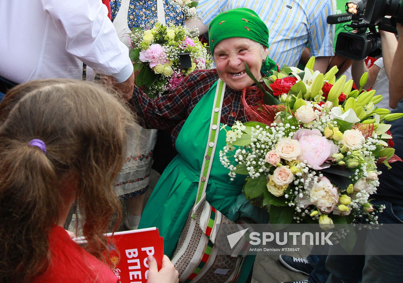 Members of Buranovskiye Babushki band arrive in Moscow