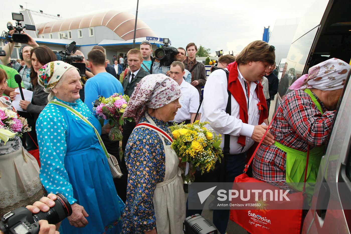 Members of Buranovskiye Babushki band arrive in Moscow