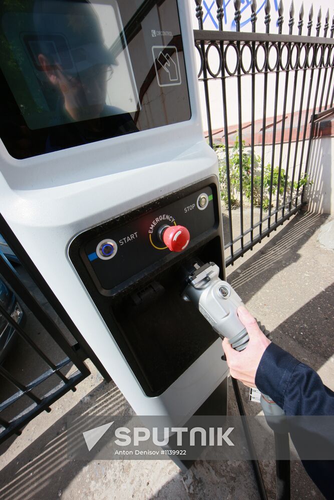 Electric car charging station at work