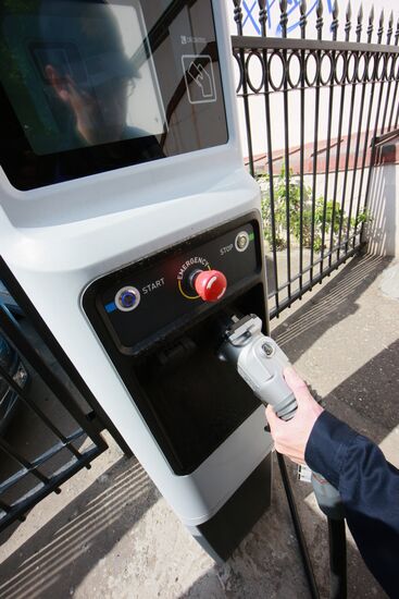 Electric car charging station at work
