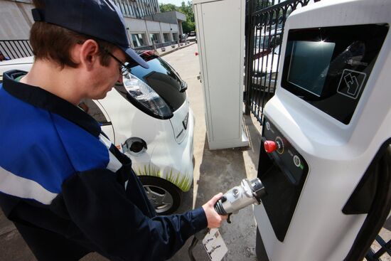 Electric car charging station at work