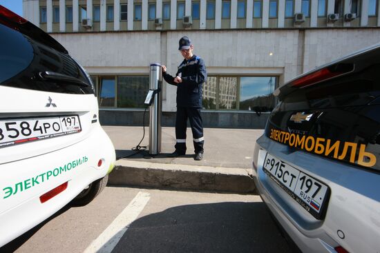 Electric car charging station at work