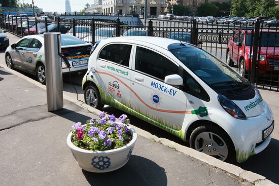 Electric car charging station at work