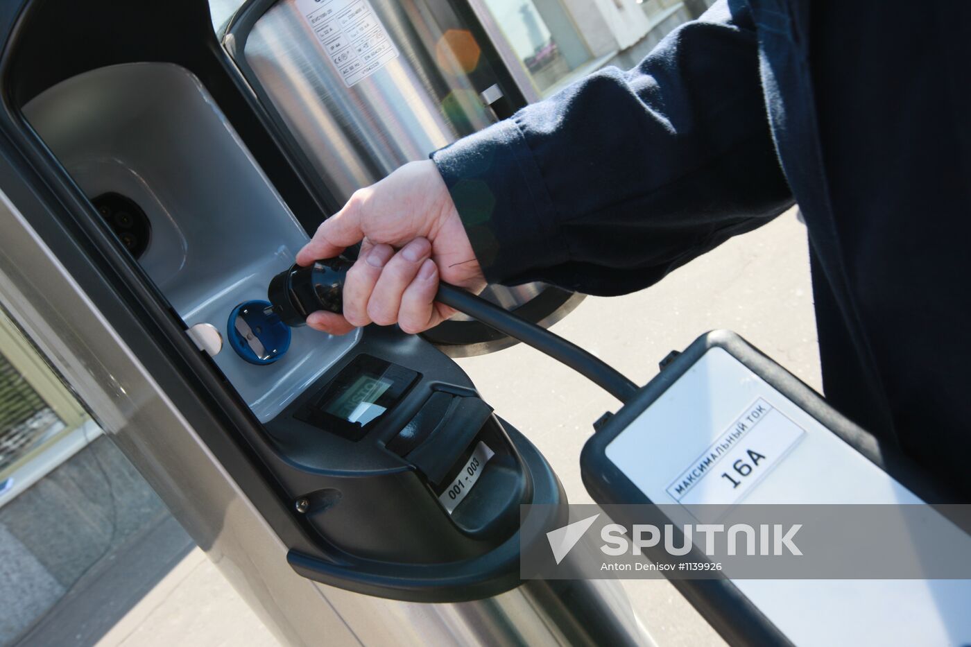 Electric car charging station at work