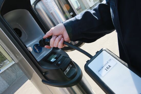 Electric car charging station at work
