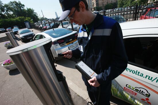 Electric car charging station at work