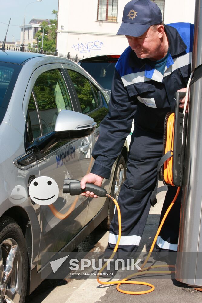 Electric car charging station at work