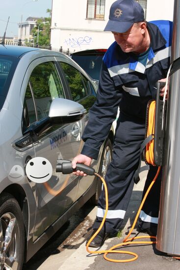 Electric car charging station at work