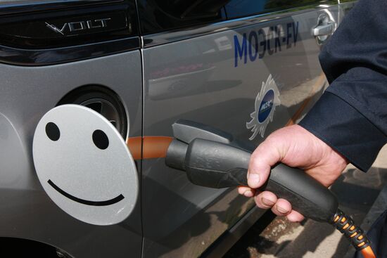 Electric car charging station at work