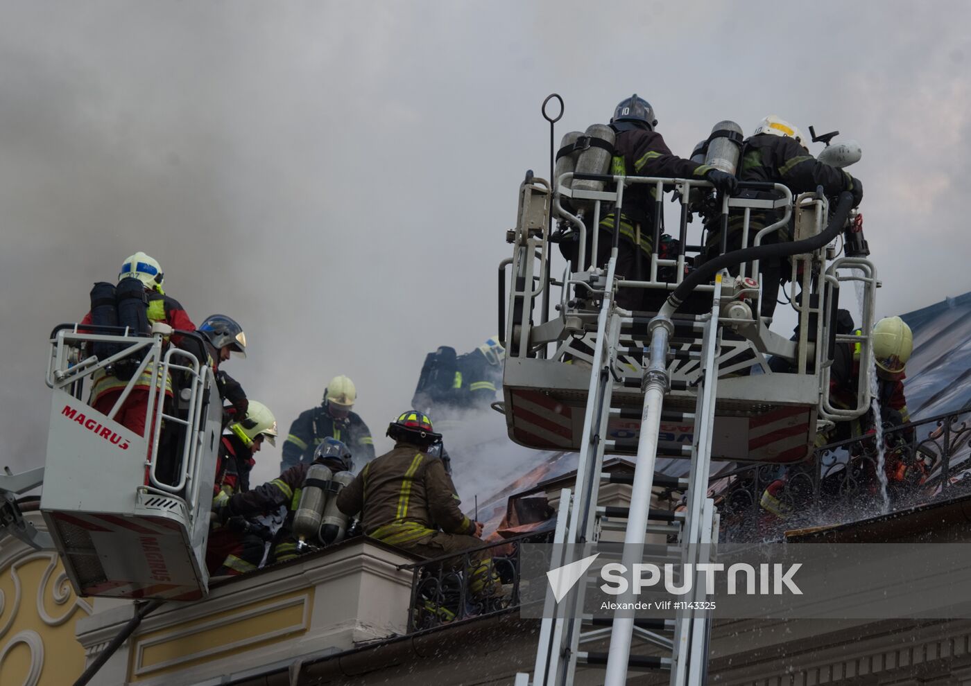 Old building on fire on Stoleshnikov Street in Moscow