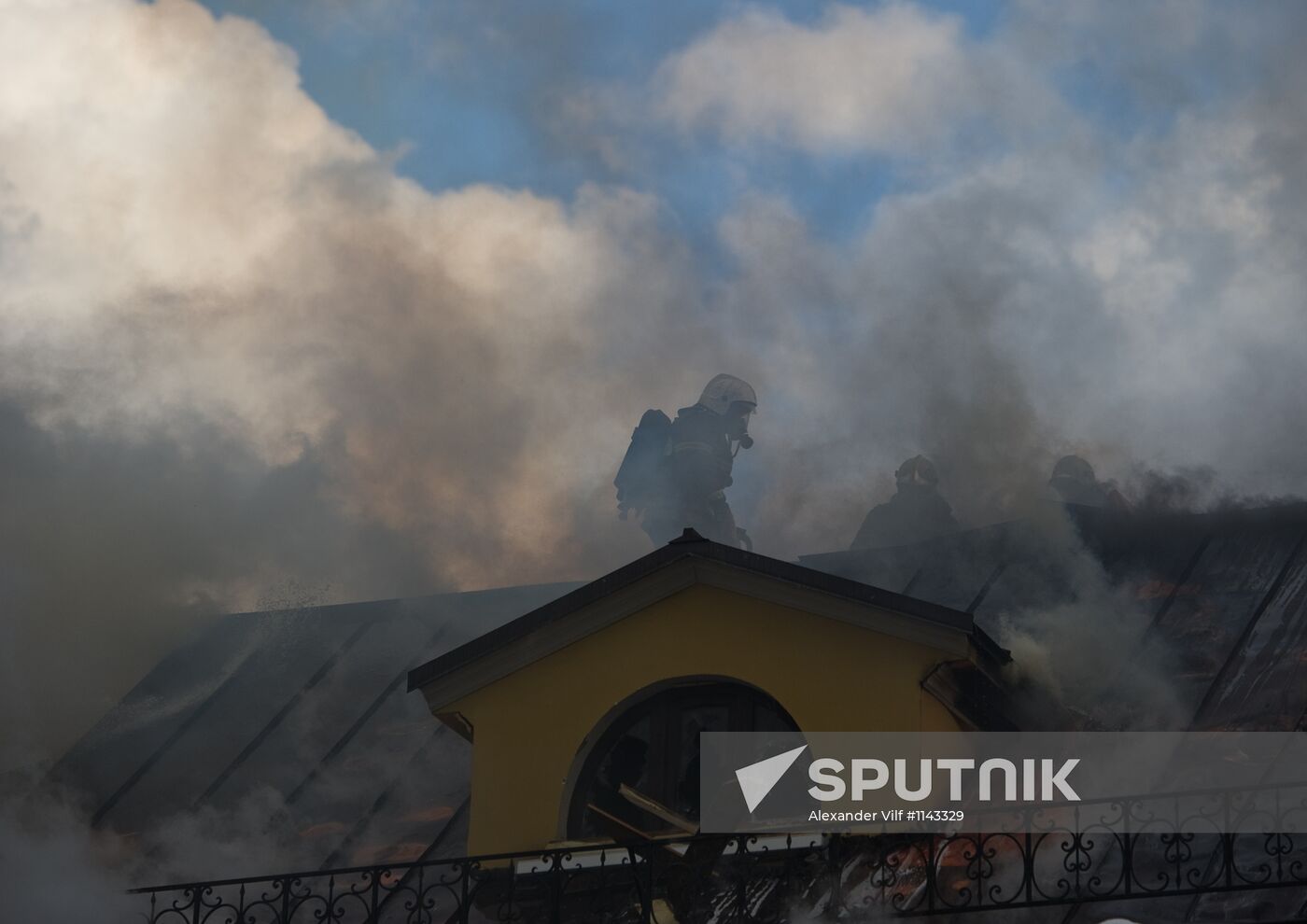 Old building on fire on Stoleshnikov Street in Moscow