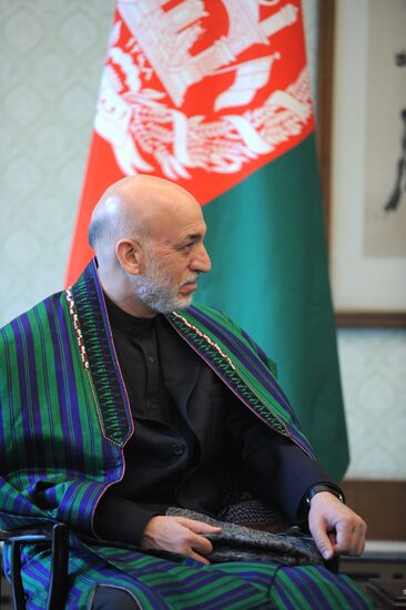 Vladimir Putin meets with Hamid Karzai