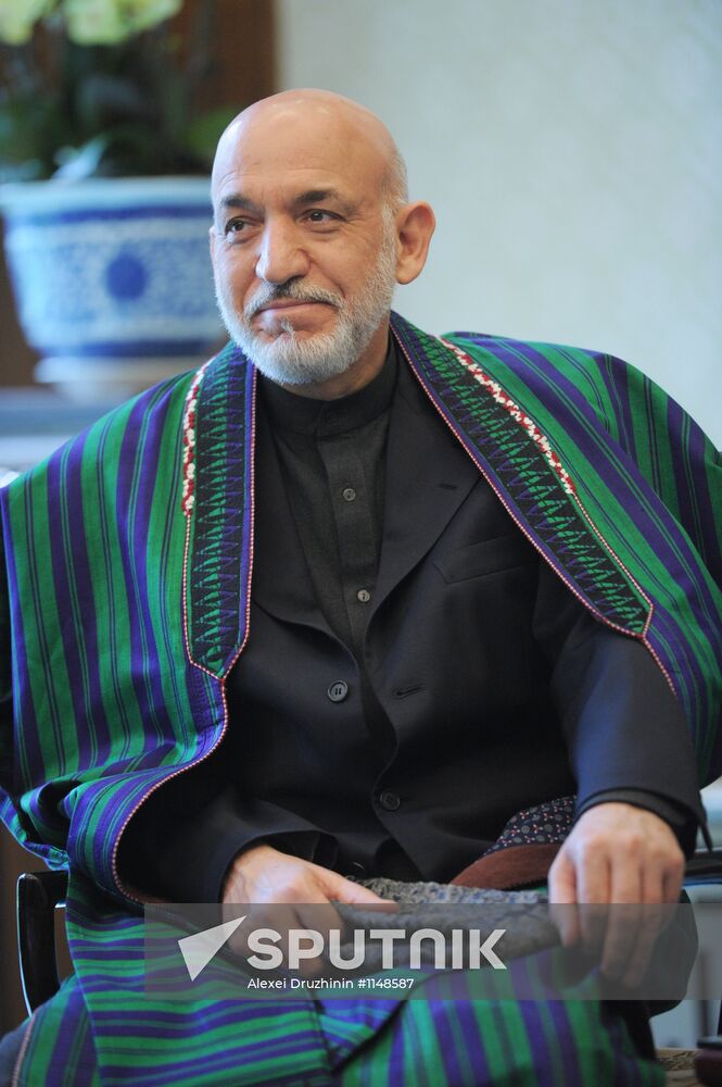 Vladimir Putin meets with Hamid Karzai