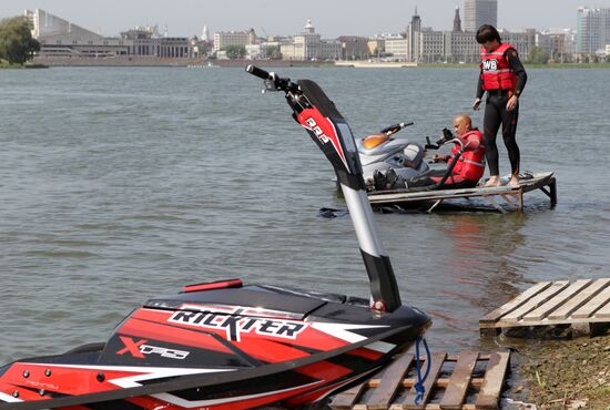 Flights over the lake on jet water board