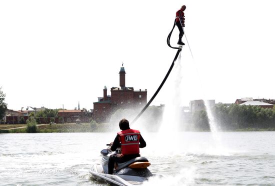 Flights over the lake on jet water board