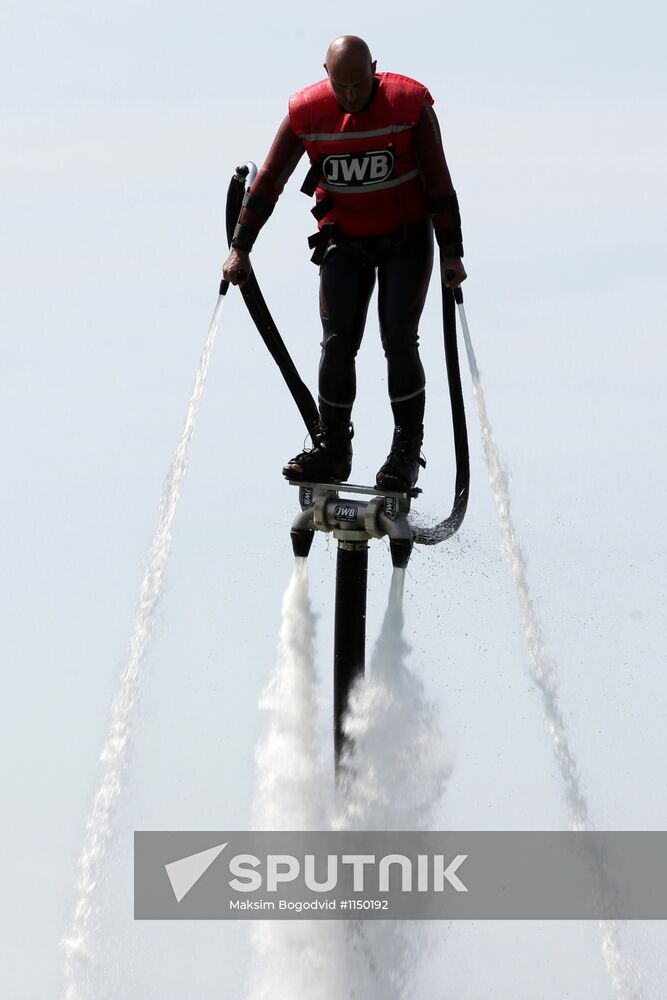 Flights over the lake on jet water board