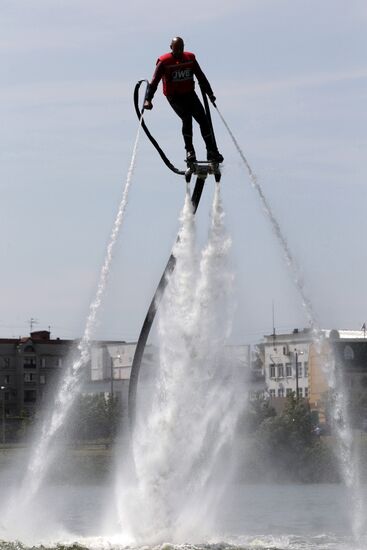 Flights over the lake on jet water board