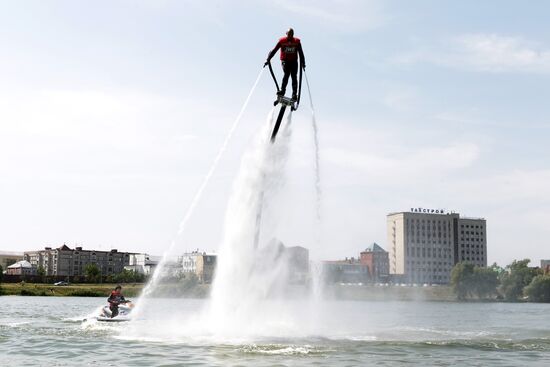 Flights over the lake on jet water board