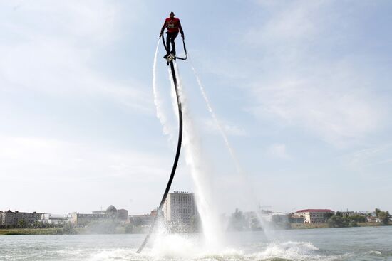 Flights over the lake on jet water board