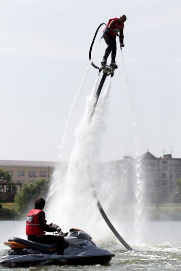 Flights over the lake on jet water board