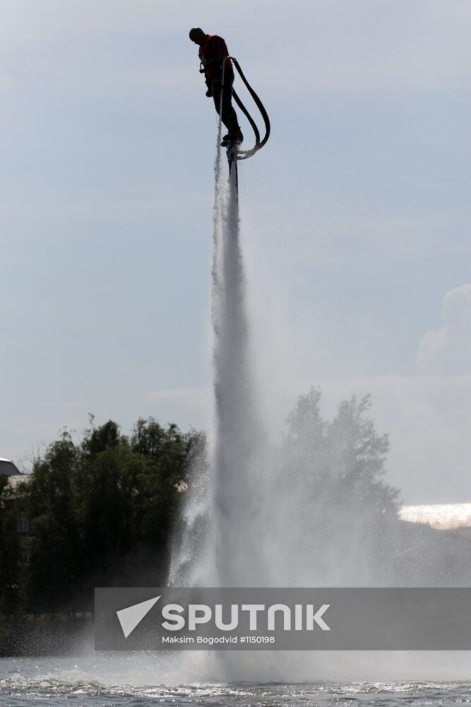 Flights over the lake on jet water board