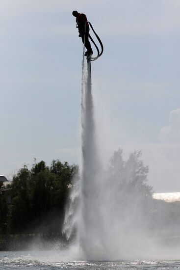 Flights over the lake on jet water board