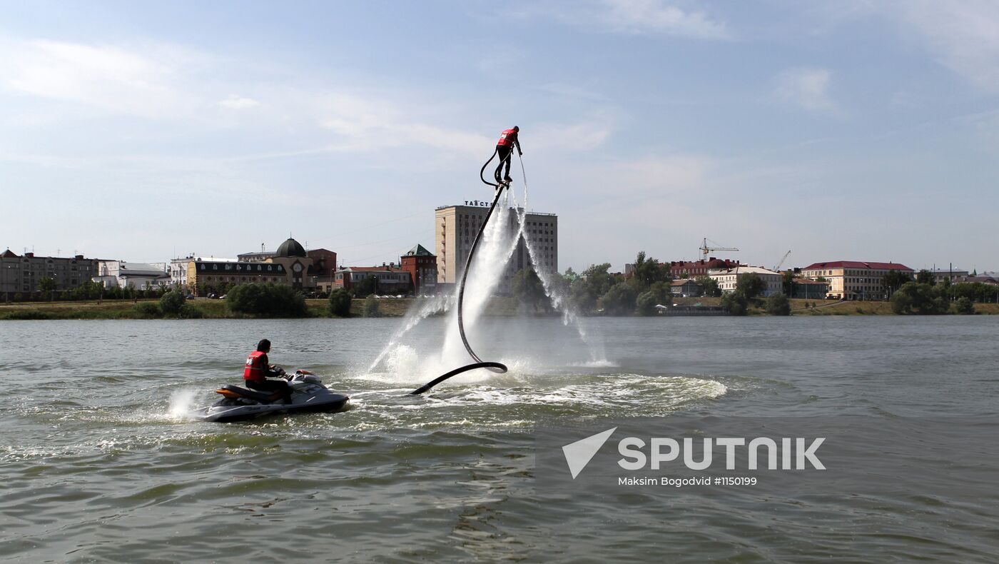 Flights over the lake on jet water board