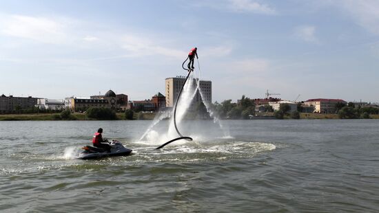 Flights over the lake on jet water board