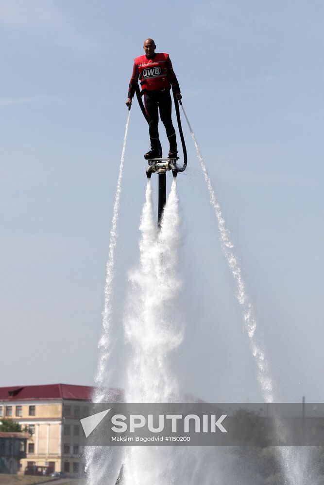Flights over the lake on jet water board