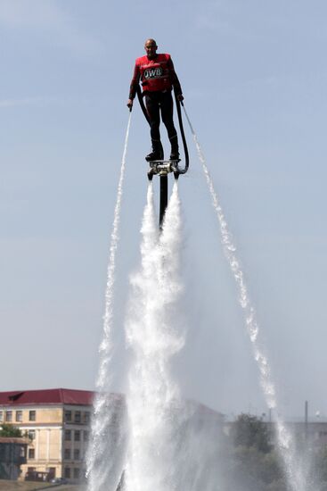 Flights over the lake on jet water board