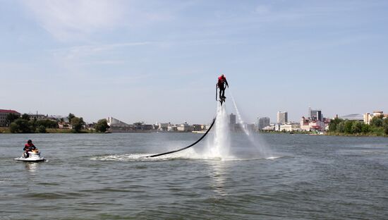 Flights over the lake on jet water board