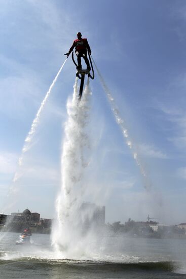 Flights over the lake on jet water board