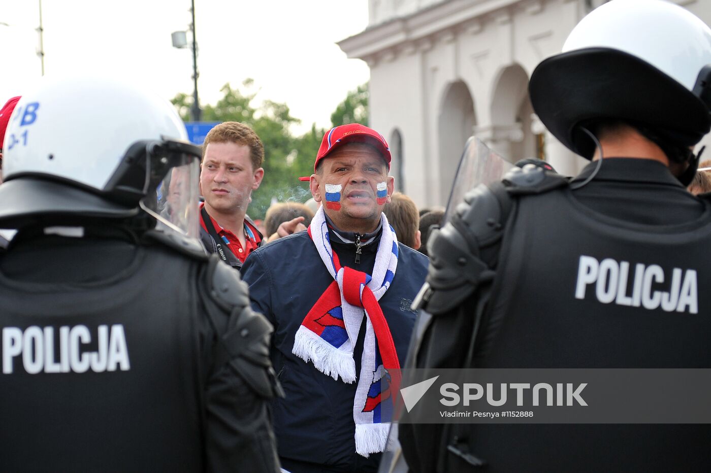 Russian fans march in Warsaw