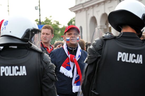 Russian fans march in Warsaw